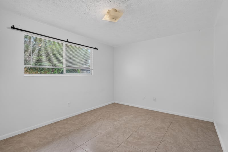 Bedroom with window at 9954 Larkdale Ct, Jacksonville, FL 32257