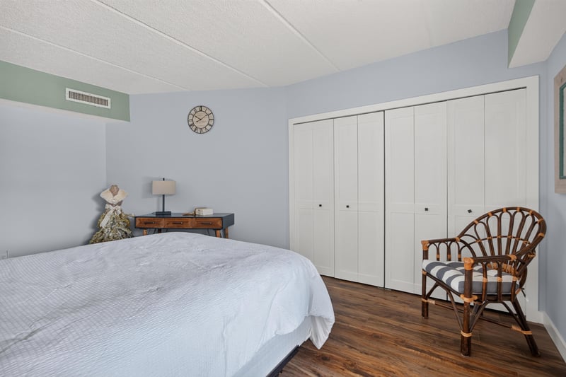 Bedroom with wicker chair at 2280 Shepard St
