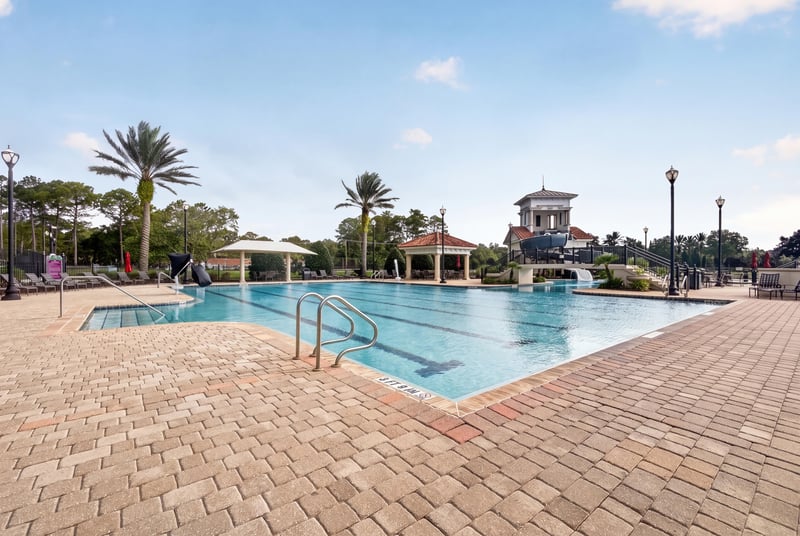 Community pool deck in Murabella