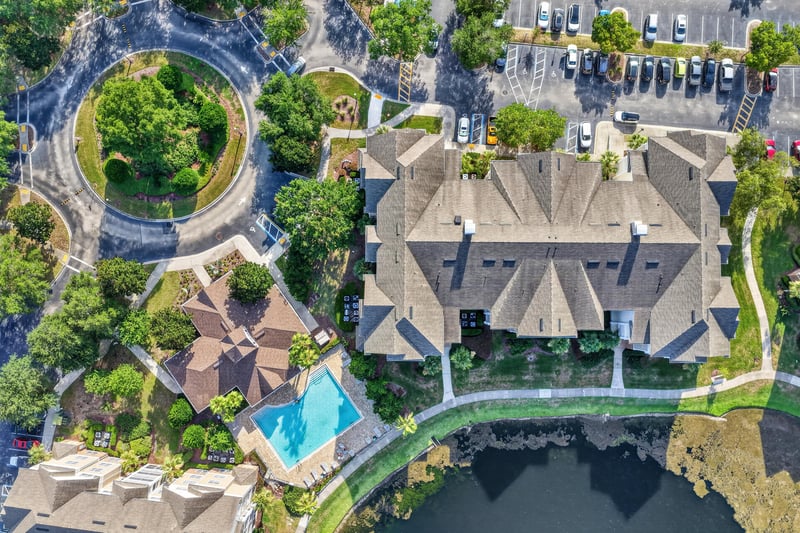 Aerial view of the community clubhouse and pool in Campfield