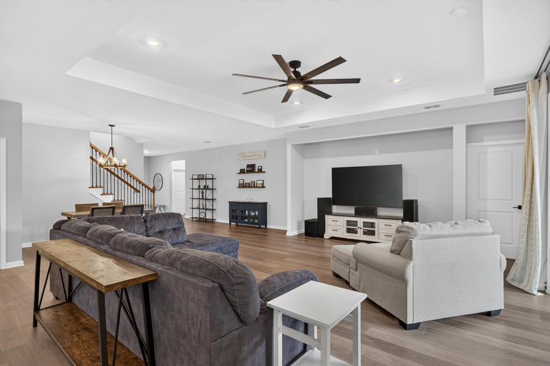 Living room with console table and media area at 2354 Jennings Farm Dr, Middleburg, FL 32068