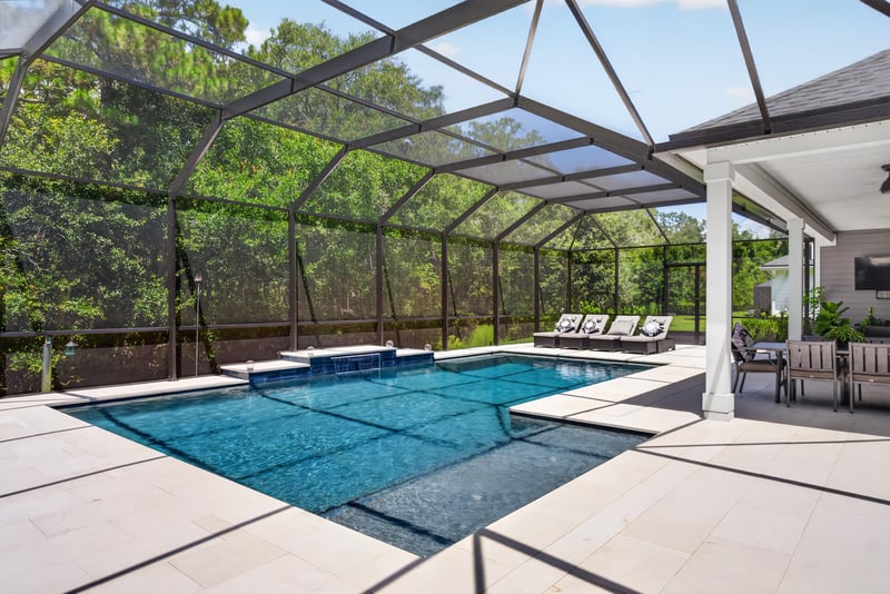 Screened lanai with pool and spa at 785 Back Creek Dr, St. Augustine, FL 32092