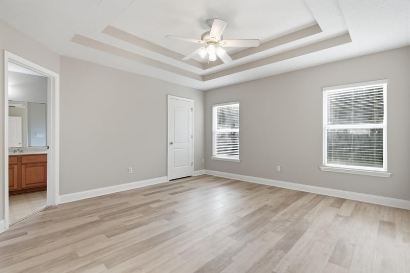 Bedroom with tray ceiling and ceiling fan at 14187 Big Spring St, Jacksonville, FL 32258