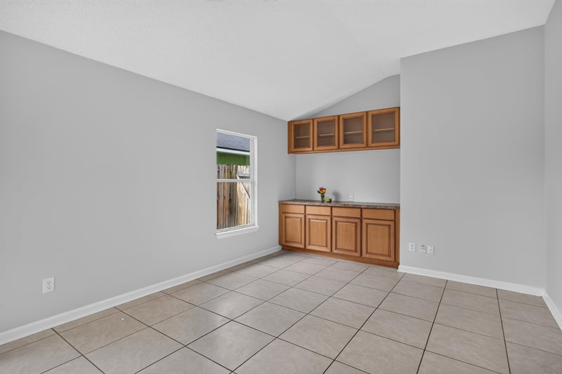 Tile room with built-in cabinetry at 456 Bay Point Way N, Jacksonville, FL 32259