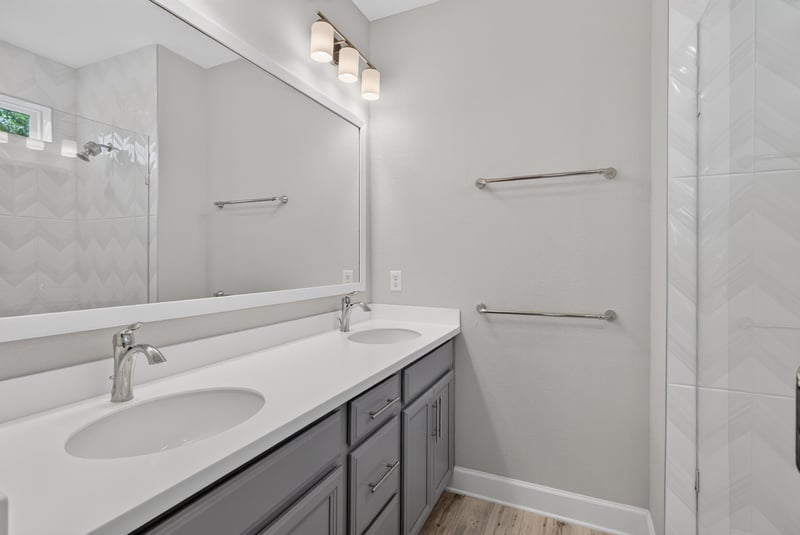 Bathroom vanity with gray cabinets at 7446 Loggerhead Ct, Jacksonville, FL 32256