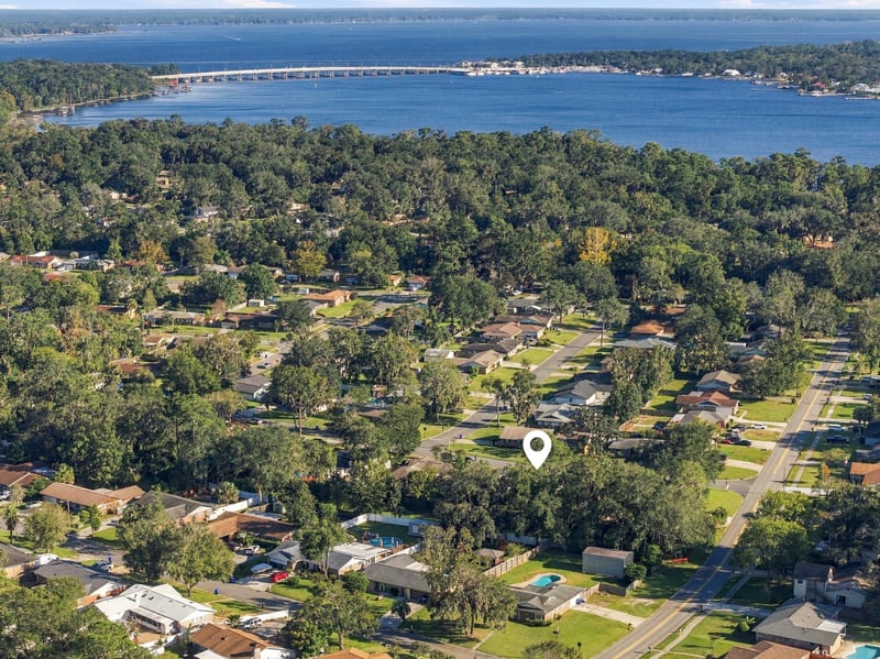 Drone aerial view of the neighborhood and tree canopy, photographed by Megapixeler on Crosby Ln, Orange Park