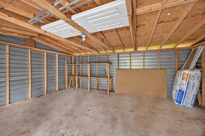Unfinished interior of detached structure at 7015 Miss Muffet Ln N, Jacksonville, FL 32210