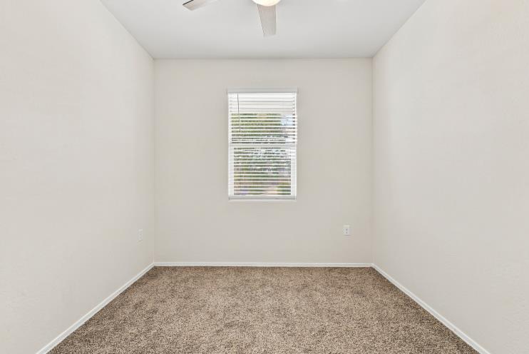 Bedroom set up as an office, empty