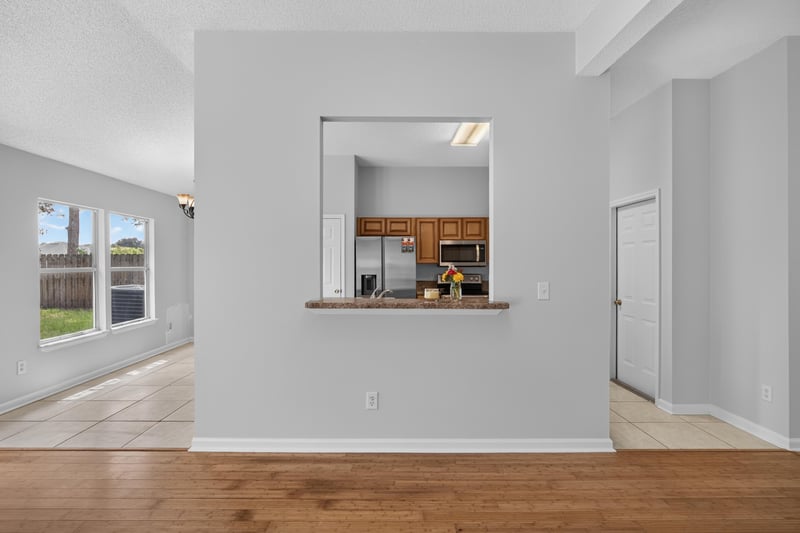 Pass-through window between kitchen and living room at 456 Bay Point Way N, Jacksonville, FL 32259