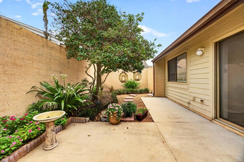 Paved patio courtyard with seating area at 3407 Fairbanks Grant Rd N, Jacksonville, FL 32223