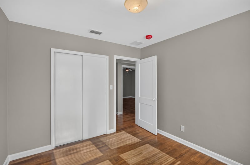 Room with closet and hardwood floors at 6338 Mercer Cir W, Jacksonville, FL