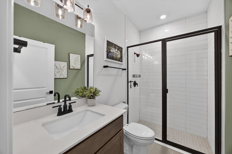 Bathroom sink with subway tile and barn door at 2354 Jennings Farm Dr, Middleburg, FL 32068