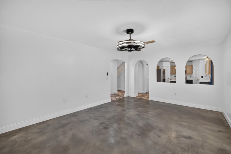 Empty room with arched doorways at 3428 Glenn Hollow Ct, Jacksonville, FL 32226
