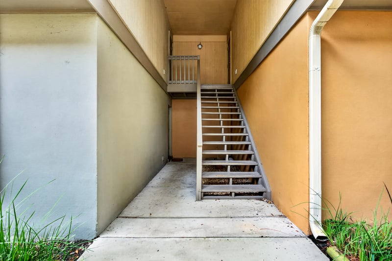 Exterior stairwell leading up to the unit at 1800 Park Ave apt 358, Orange Park, FL