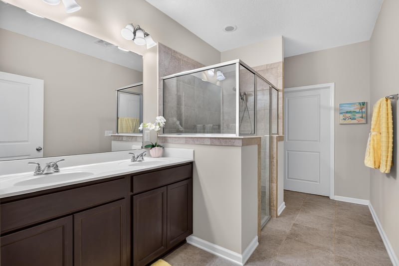 Bathroom with vanity and glass-enclosed shower at 2378 Caney Oaks Dr, Jacksonville, FL