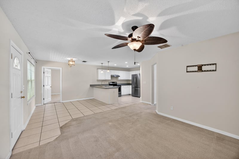 Living Room to Kitchen at 1568 Backwater Drive, Middleburg, FL 32068