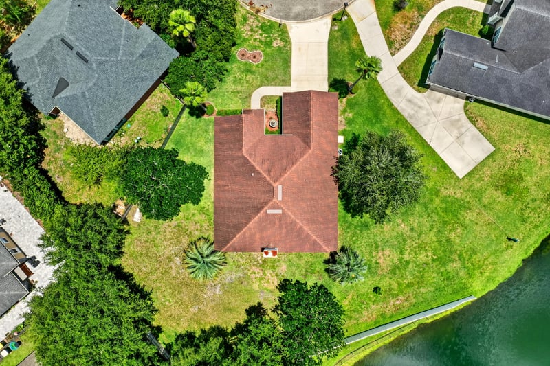 Top-down aerial view of the house and backyard at 2480 Ridge Will Dr, Jacksonville, FL 32246