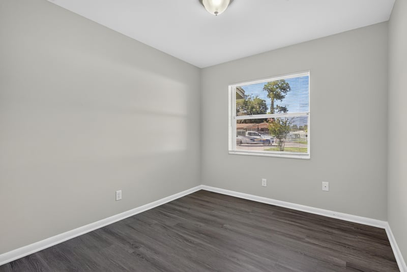 Bedroom with window at 5503 Boeing Dr, Jacksonville, FL 32207