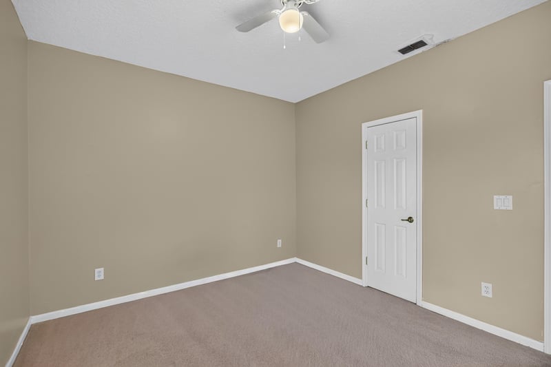 Empty bedroom with carpet at 2875 Pebblewood Ln, Orange Park, FL 32065