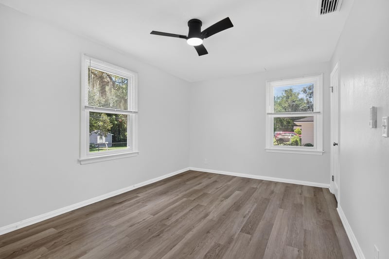 Bedroom with ceiling fan and window at 855 Cornwallis Dr, Jacksonville, FL