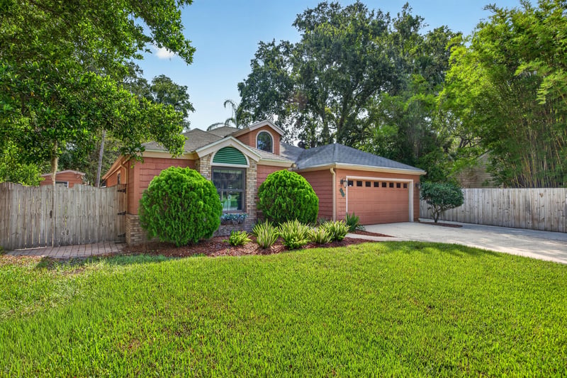 Front exterior wide view with driveway at 4837 Pareja Ct, Jacksonville, FL 32225