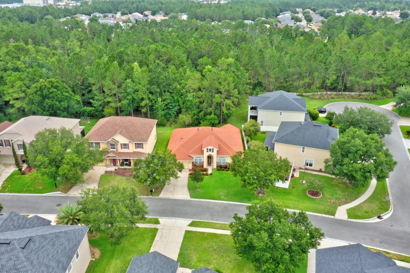 Aerial view of the home among surrounding houses in Orange Park