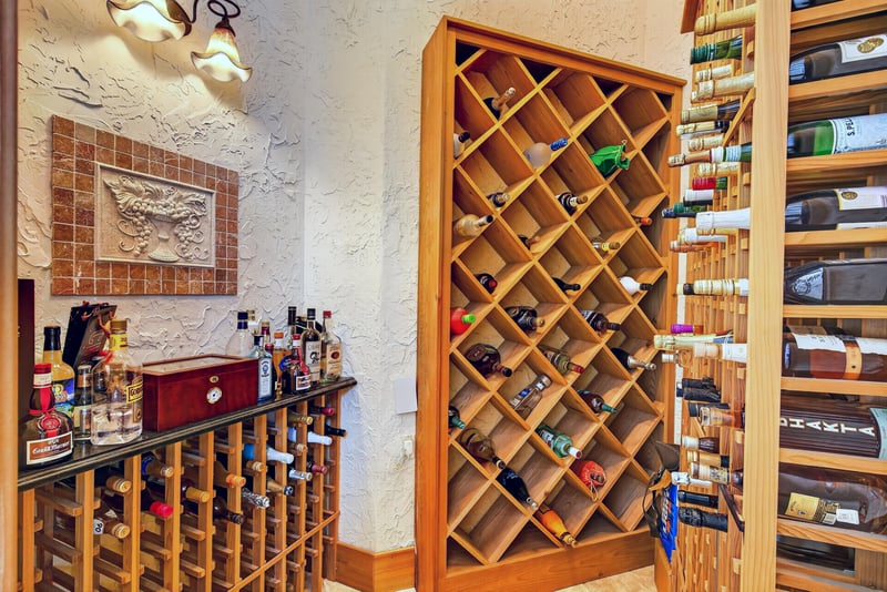 Wine cellar with wood racks and bottle storage at 344 Broward Rd, Jacksonville, FL