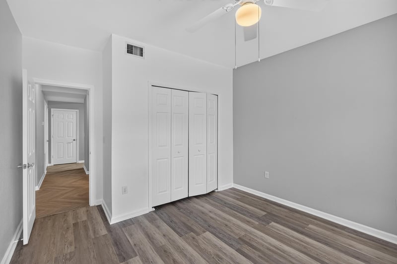 Hallway with closet door at 10075 Gate Pkwy unit 1905, Jacksonville, FL 32246