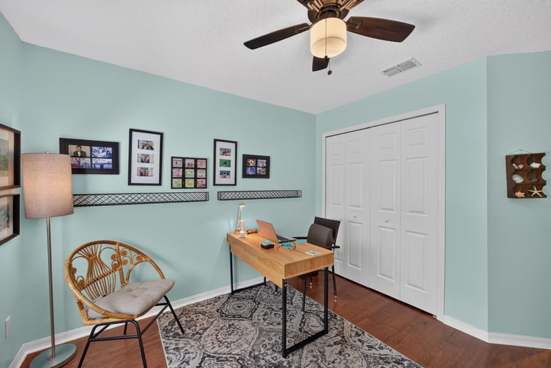 Office nook with desk and wood floors at 1820 Burgess Hill Dr E, Jacksonville, FL