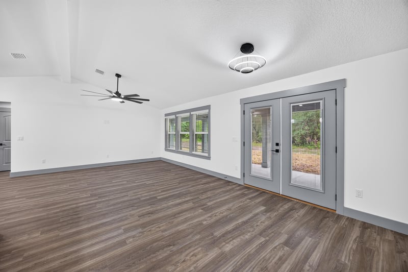 Open dining area with wood-look flooring at 4800 Acacia St, Middleburg, FL 32068