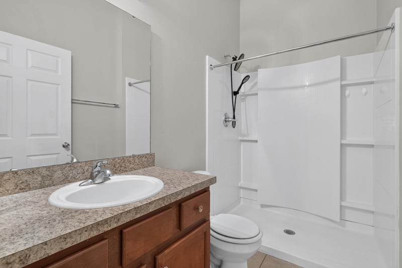 Bathroom with vanity and tub-shower combo at 8196 Cabin Lake Cir, Jacksonville, FL 32256