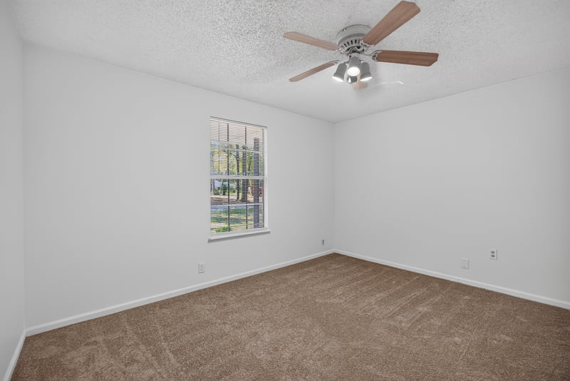Bedroom with carpet and ceiling fan at 2829 Blackberry Ave