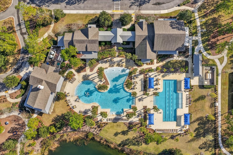 Aerial view of the pool and clubhouse grounds in Whisper Creek