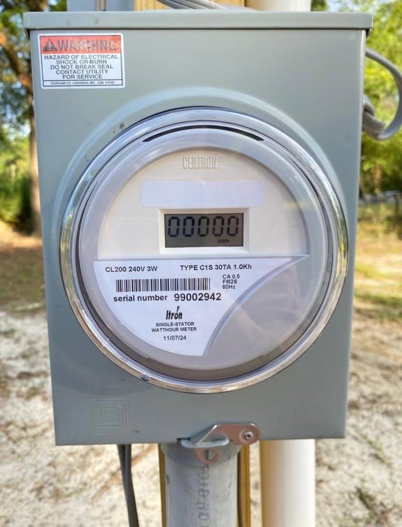 Close-up of the utility meter at 4890 McAllister Rd, Middleburg, FL 32068
