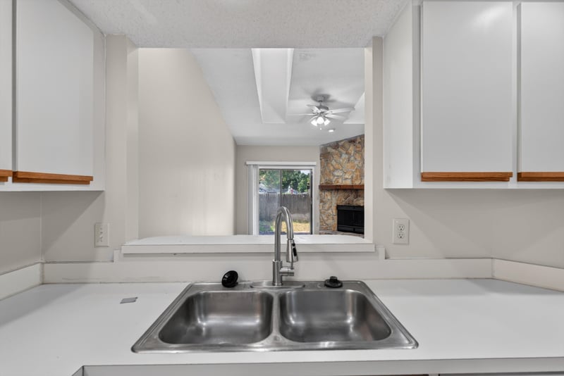 Kitchen sink and counter at 8010 International Village Dr, Jacksonville, FL 32277