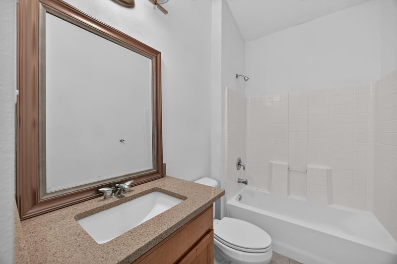 Bathroom mirror and tub reflection at 3101 E Banister Rd, St. Augustine, FL 32092