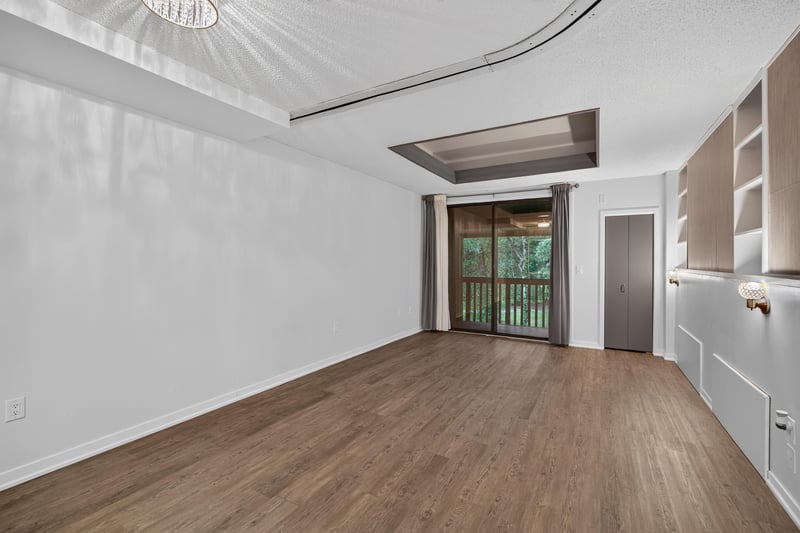 Living room with vaulted ceiling and skylight at 2910 Ravines Rd, Middleburg, FL 32068