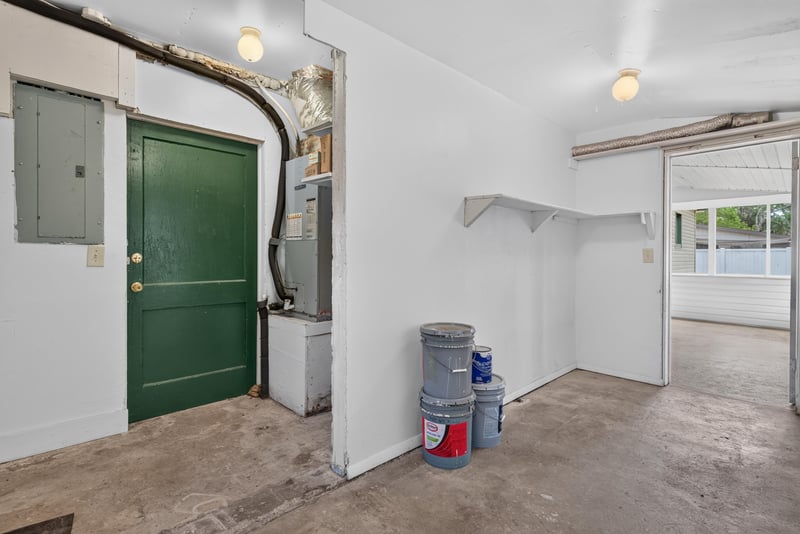 Utility room with laundry hookup and green door at 2618 Arlex Dr E, Jacksonville, FL