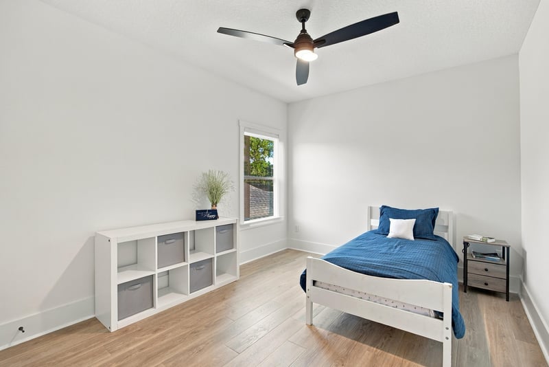 Bedroom with cube shelf and blue bedding at 907 Seagrove Dr, Ponte Vedra Beach, FL 32081