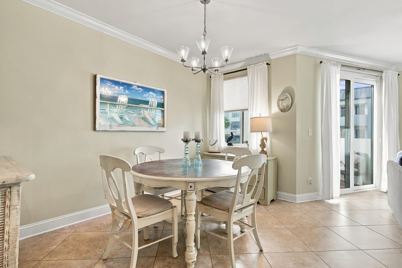 Dining area with round table and sliding door at 805 Spinnakers Reach Dr, Ponte Vedra Beach, FL 32082