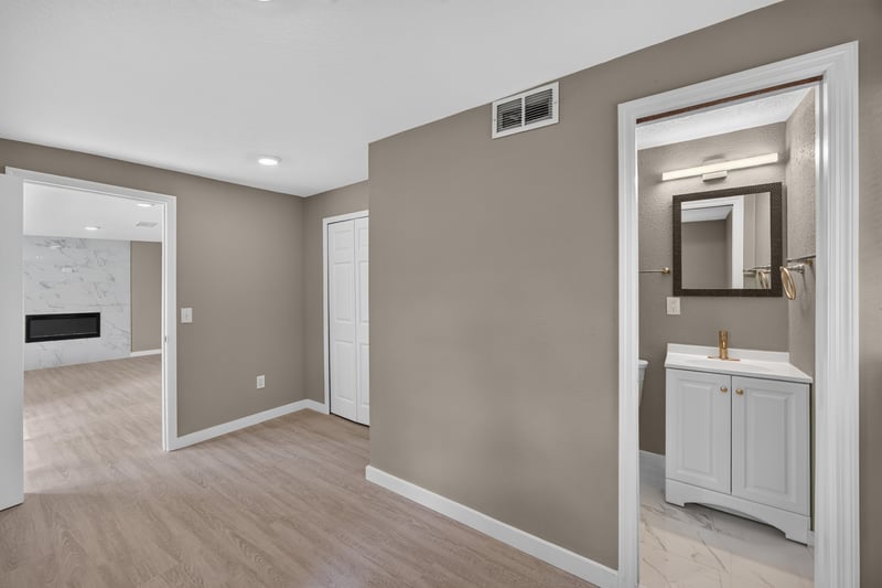 Hallway leading to bathroom and living area at 184 Draco St, Orange Park, FL 32073