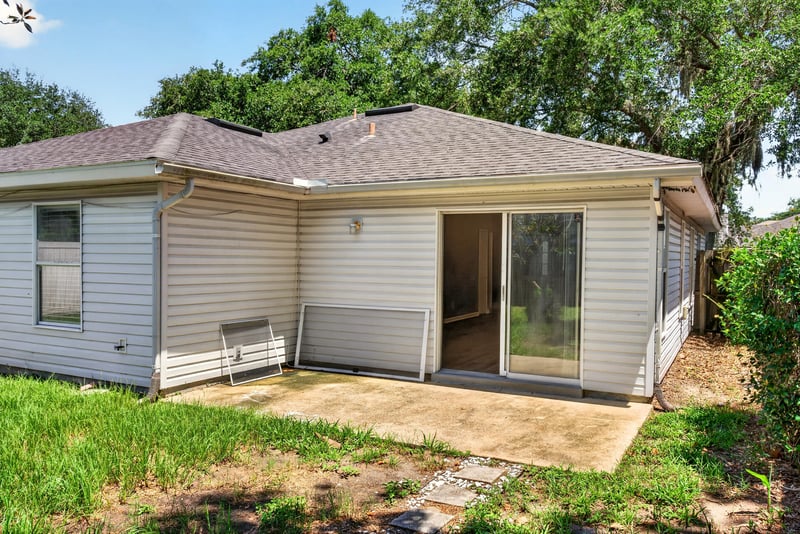Back patio with covered porch at 1108 Hidden Cove Cir S, Atlantic Beach, FL 32233