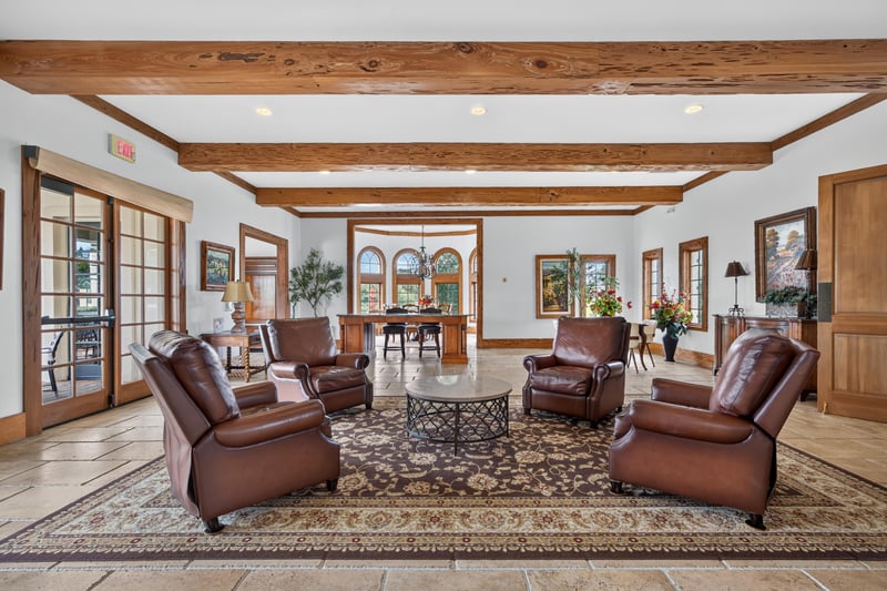 Clubhouse sitting area with wood beam ceiling in Murabella