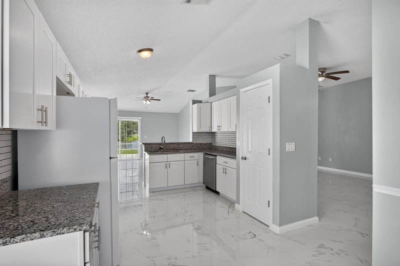 Kitchen with granite counters and recessed lighting at 490 Hillside Dr, Orange Park, FL 32073