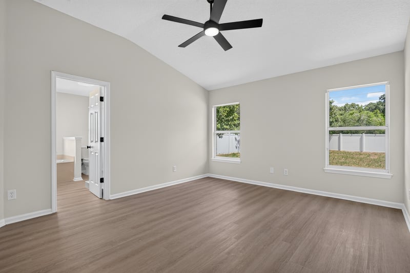 Primary bedroom, empty, with large windows at 224 Pine Arbor Cir, St. Augustine, FL 32084