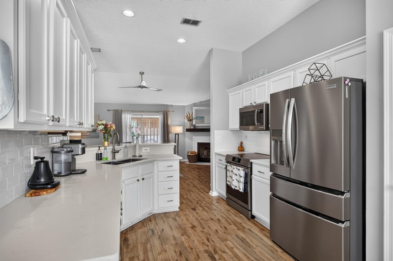Kitchen with island and stainless steel appliances at 12825 Kelsey Island Dr, Jacksonville, FL 32224