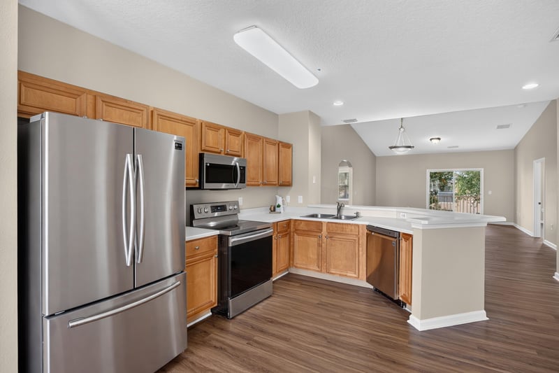 Kitchen with stainless fridge and microwave at 3750 Silver Bluff Blvd, Orange Park, FL