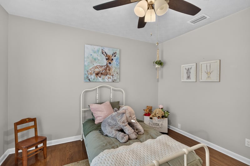 Bedroom with twin bed and stuffed animals at 5843 Ovella Rd, Jacksonville, FL 32244
