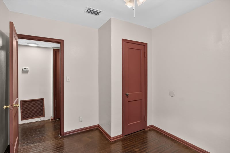 Hallway with red trim doors at 2132 Allandale Cir W, Jacksonville, FL