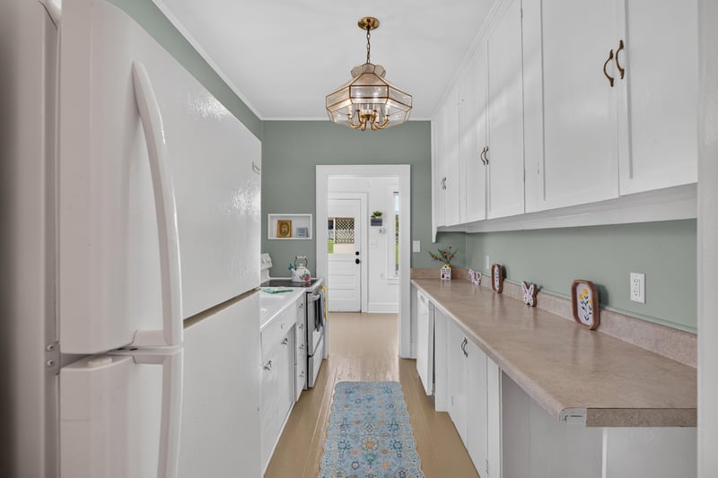 Kitchen hallway with pendant light at 101 N Lake St, Crescent City, FL